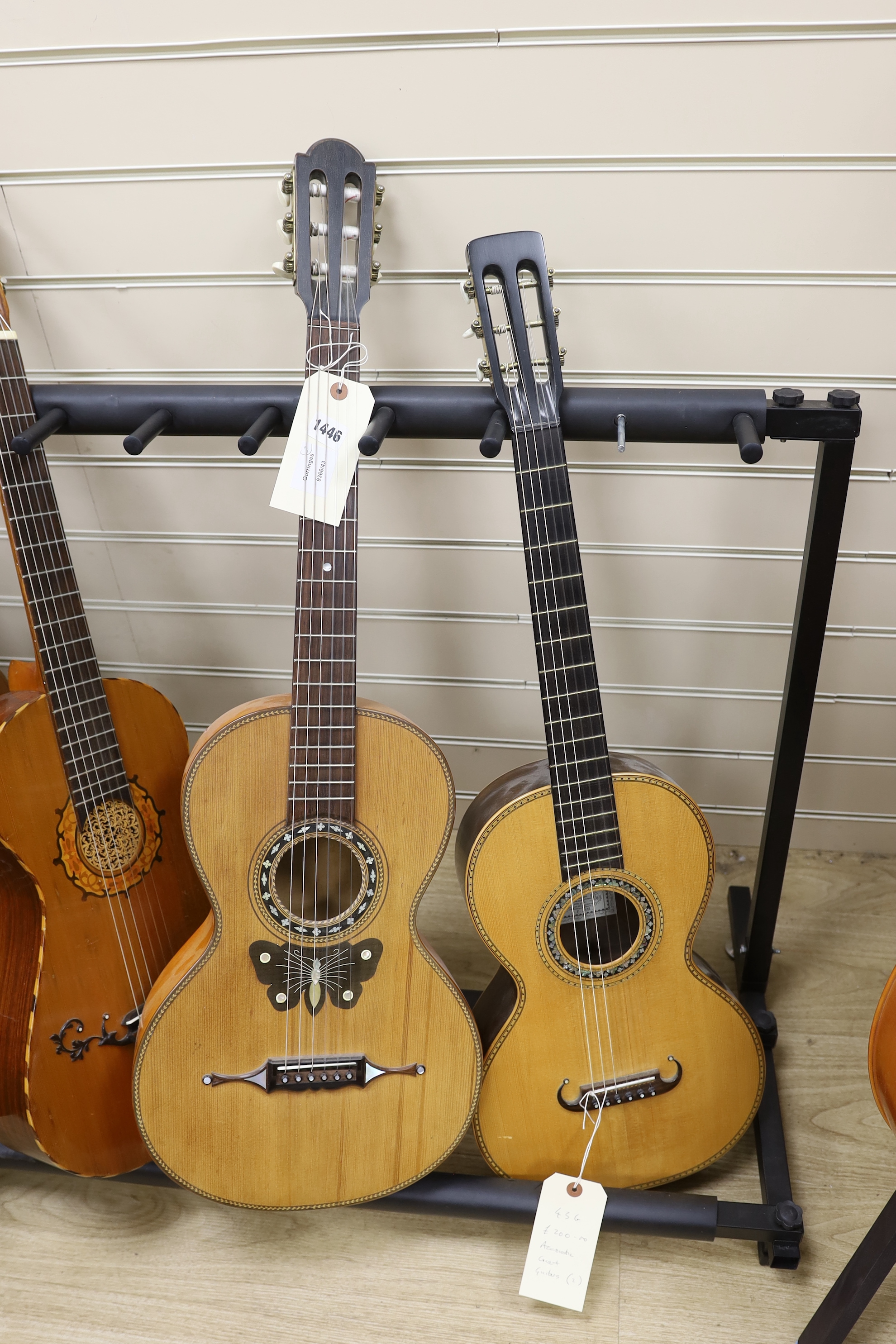 A parquetry inlaid acoustic concert guitar and another (2)